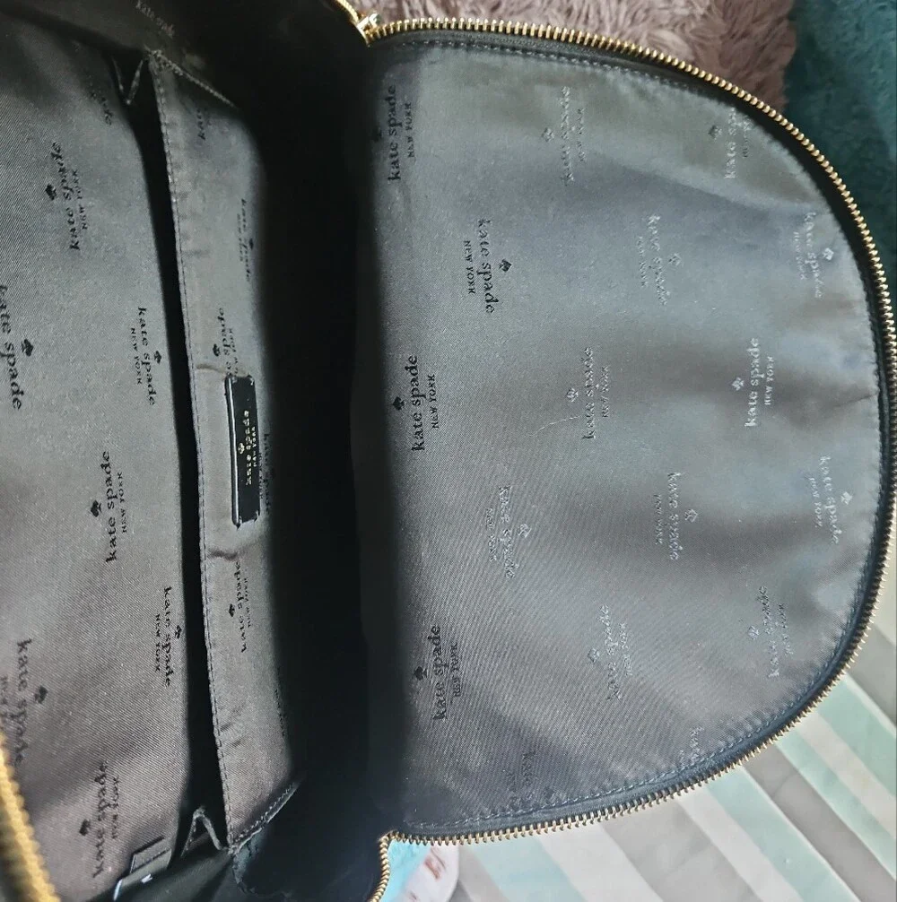 AS-IS Kate Spade black leather backpack LEFT STRAP AT THE TOP TORN. STILL NEW